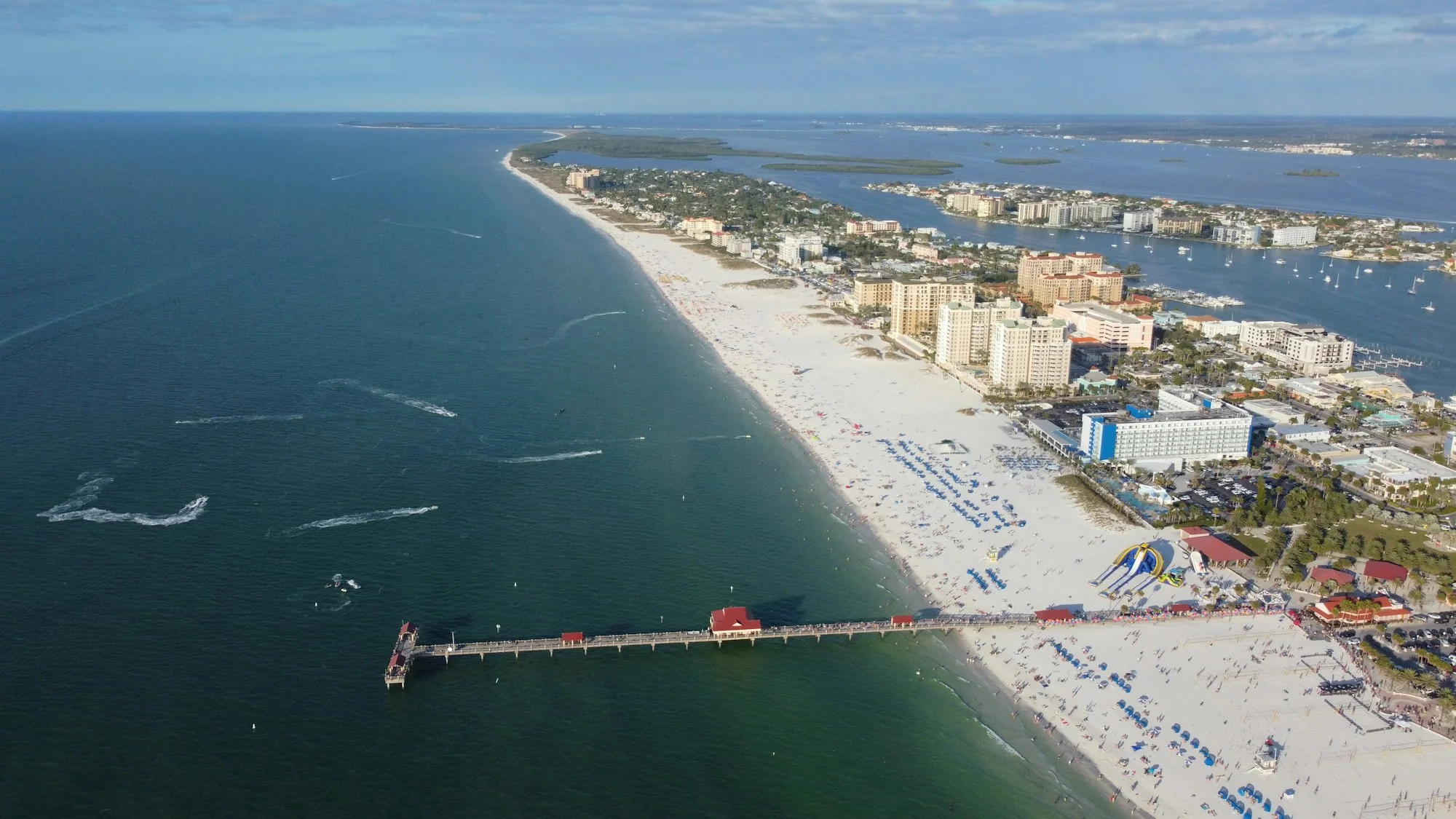 Clearwater Beach Florida white sand and Gulf water with Pier 60
